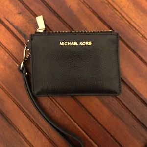 Small wrist wallet, black leather with gold